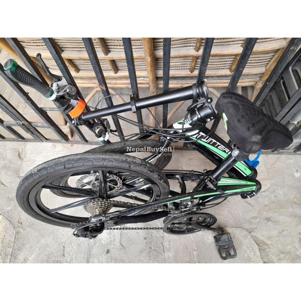 Double folding geared bicycle that can fit in a bag - 7/10