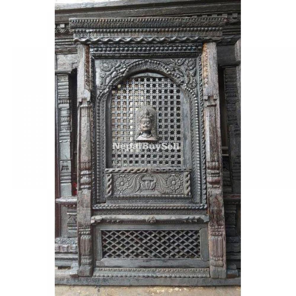 Intricately Handcarved Old Newari Window with Lord Bhairab on Panel - 1