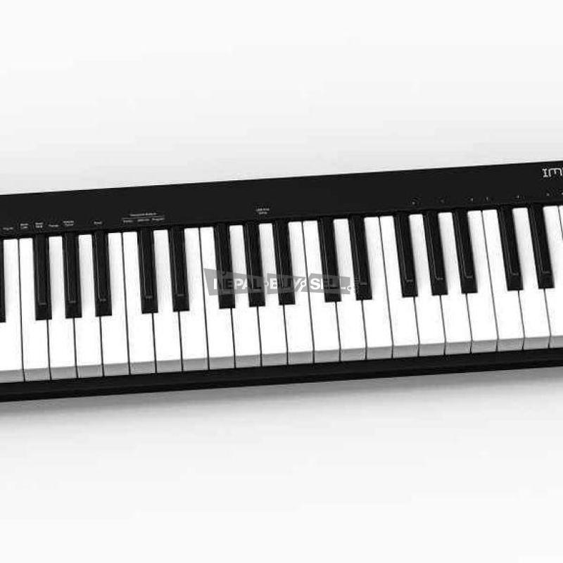 Nektar impect GX49 key midi keyboard - 1
